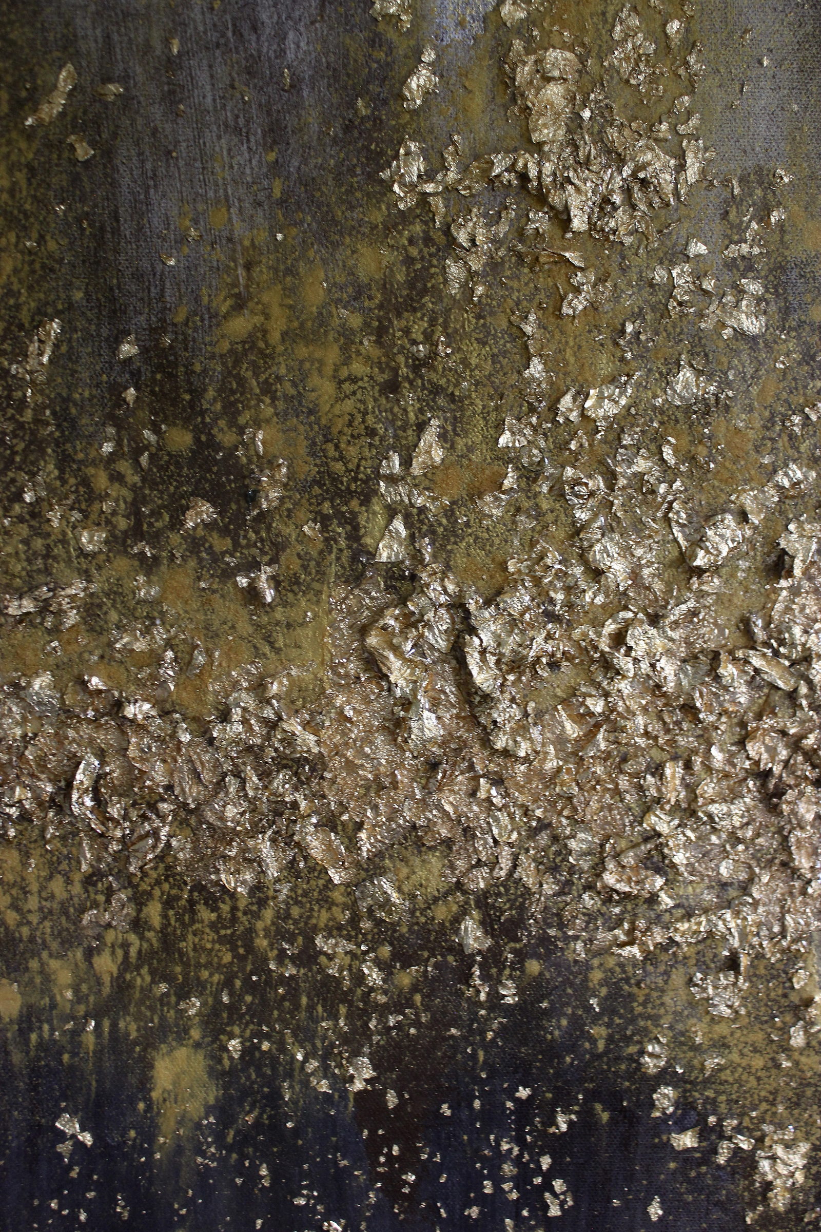 Hand applied gold leaf and mineral texture in close detail